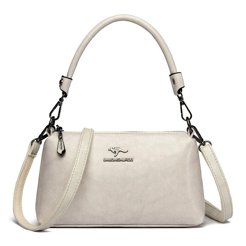 New single-shoulder bag, simple cross-body bag, trendy and retro small square bag.