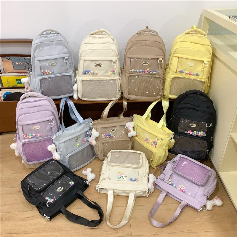 Little fresh original style literary soft girl student schoolbag Korean version hairball large capacity shoulder tutoring bag
