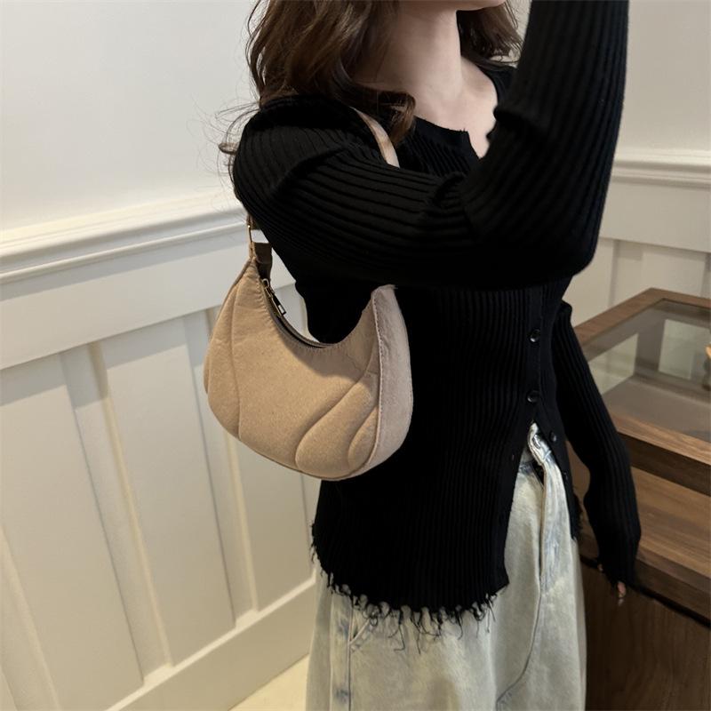 This Year's Trendy Women's Minimalist Dumpling Bag - a New Korean-style Shoulder Bag with Niche Fashion and Elegant Underarm Design.