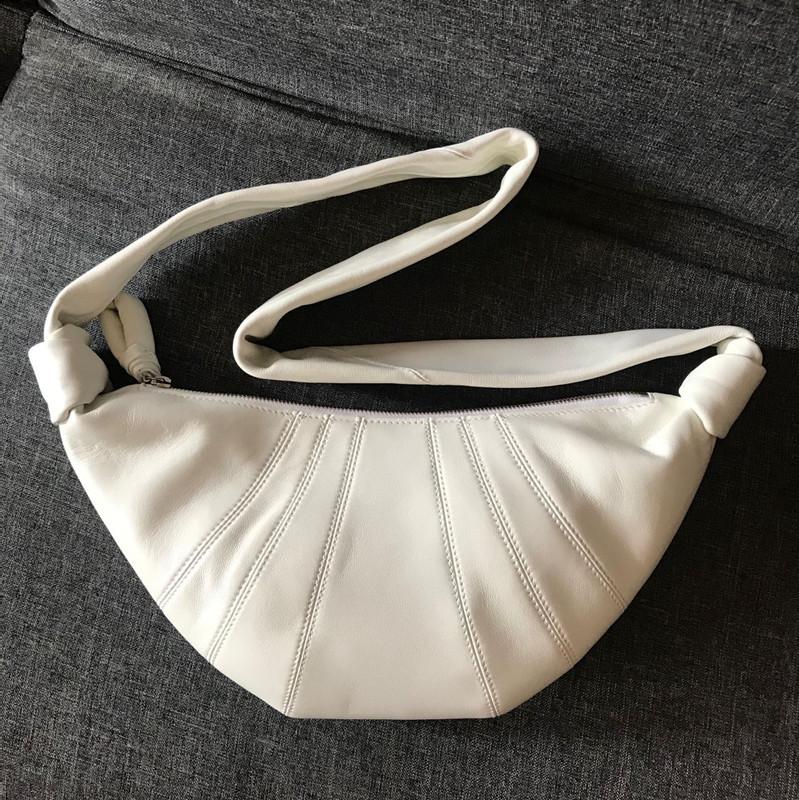 Trendige Retro-Tasche aus Rindsleder im Croissant-Stil + modische Baguette-Umhängetasche aus echtem Leder für Damen