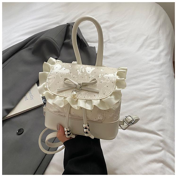 Korean version of fashionable girl style portable small bag 2025 new lace lace high value casual backpack