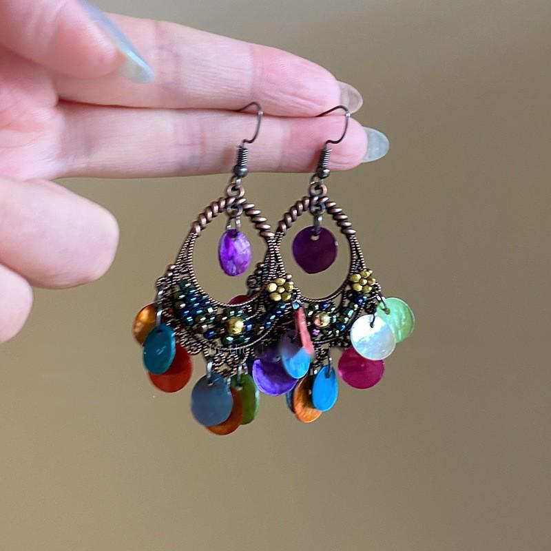 Retro ethnic style round hollow earrings Bohemian temperament elegant earrings niche fashion light luxury earrings women