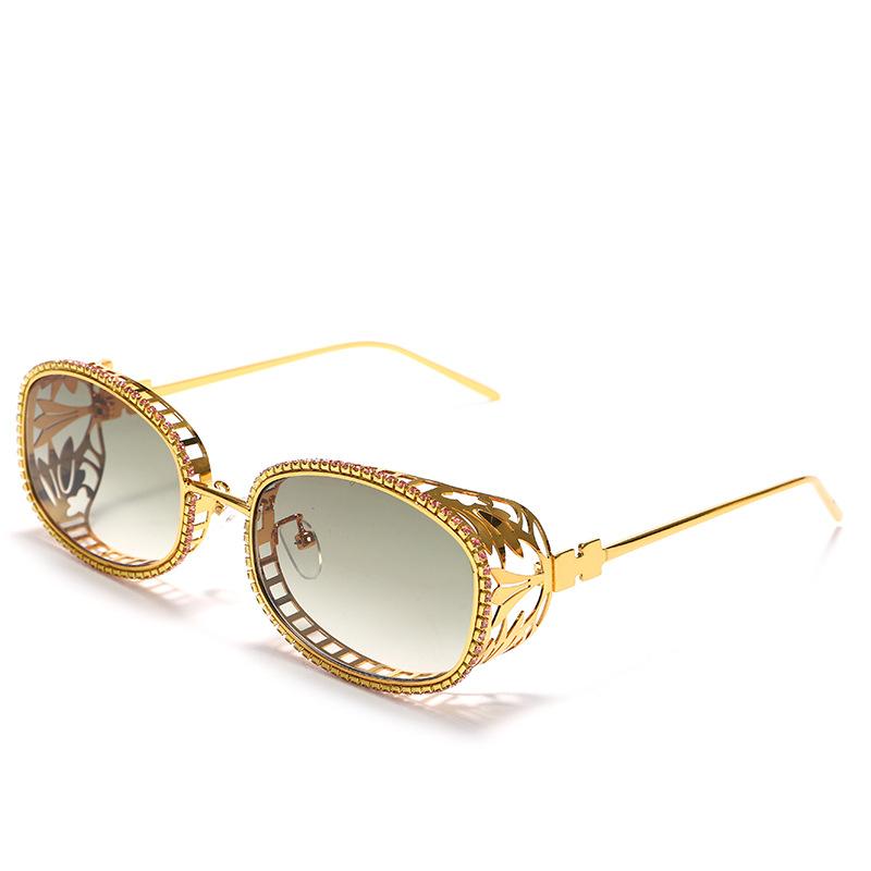 New steampunk-style hollow metal oval sunglasses with a futuristic design, featuring a unique and trendy handmade chain and available in multiple
