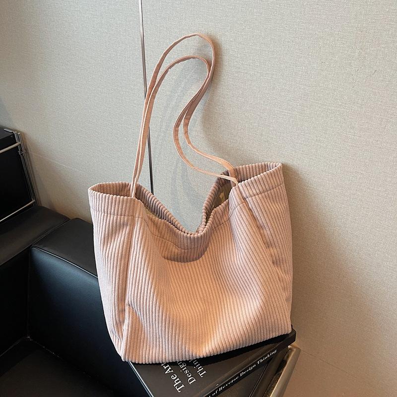 

Bags women s large-capacity women s bags autumn and winter new trendy casual shoulder bags class commuter messenger bags розовый