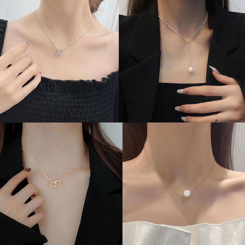 

Elegant Zircon Titanium Steel Necklace: Women s Luxury Clavicle Chain with Fashion Pendant