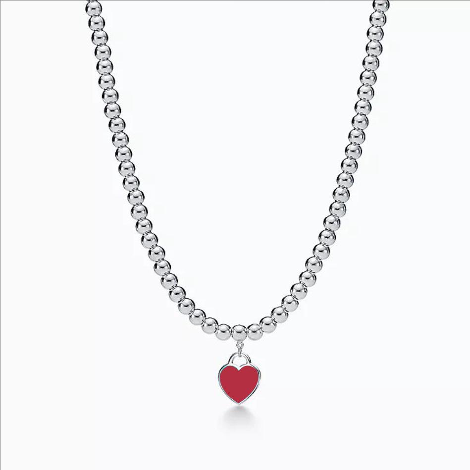 Heart-Shaped Enamel Cross Chain Necklace with Peach Heart Beads for Women - Fashionable Classic Style