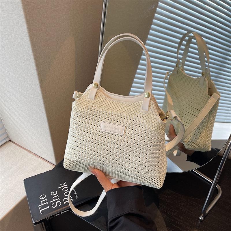 Nischendesign Tasche Damen neue Sommer Umhängetasche gestrickte gewebte Tasche lässige tragbare Beuteltasche