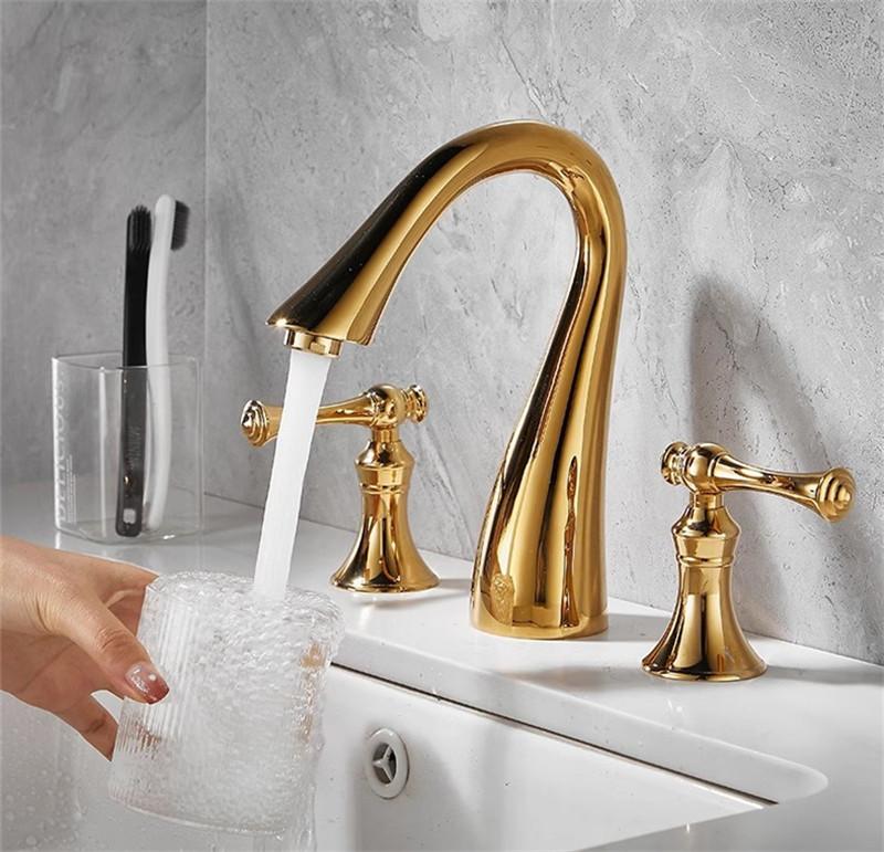 

Tuqiu Роскошные смесители для раковины Латунный золотой смеситель для ванной комнаты Широко распространенные смесители для раковины Смеситель для мойки с 3 отверстиями для горячей и холодной воды