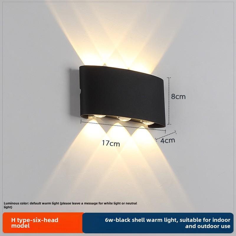 LED Outdoor Four-Leaf Clover Wall Light - Up and Down Beam Decoration for Garden and Exterior Walls.