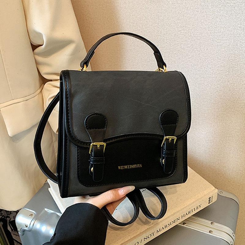 

Retro fashion backpack women s autumn new student commuter small backpack premium sense oblique span women s bag чорний