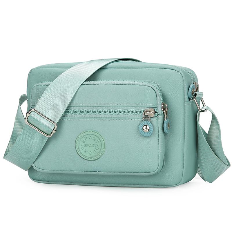 

Сумка в нейтральном стиле из легкой и простой нейлоновой ткани, новая женская сумка через плечо. [Направление молнии - Ran