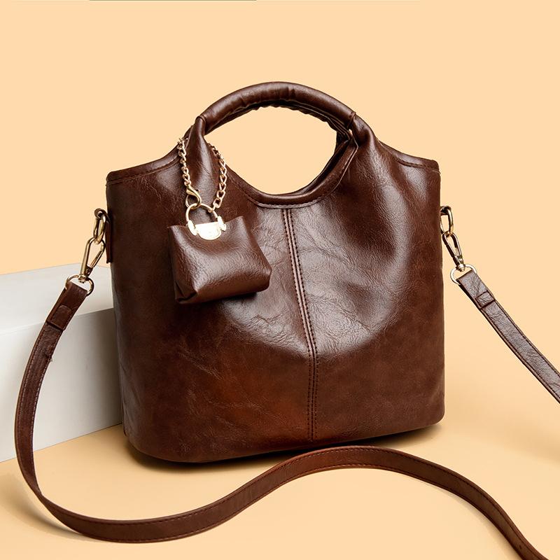 A Fashionable and Retro Hand-held Bucket Bag for Women A High-end and Versatile Single-shoulder Crossbody Bag