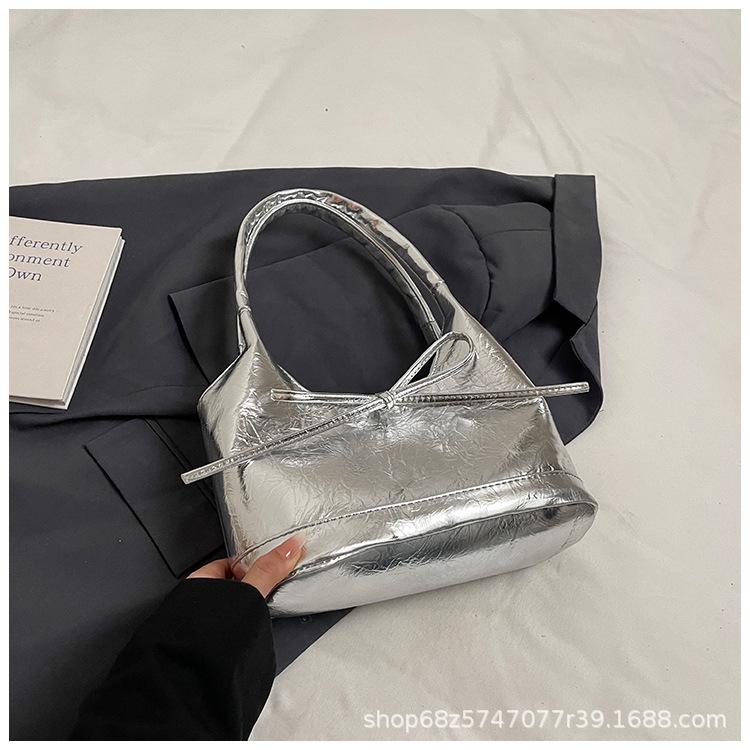 Bow niche portable bucket bag women's 2025 new trendy fashion simple commuter casual shoulder bag