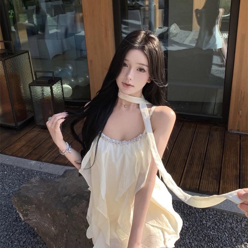 French apricot nail drill suspender dress women's summer ruffle edge loose short skirt design sense pure desire a word skirt