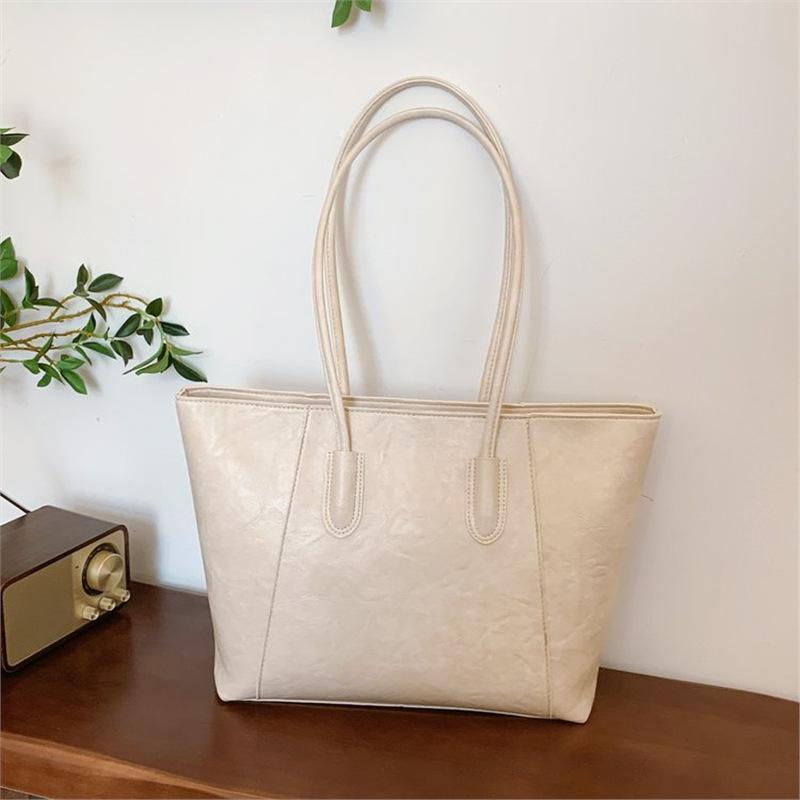 Korean version of fashionable large-capacity tote bag women's 2025 new simple casual shoulder bag commuter versatile portable women's bag