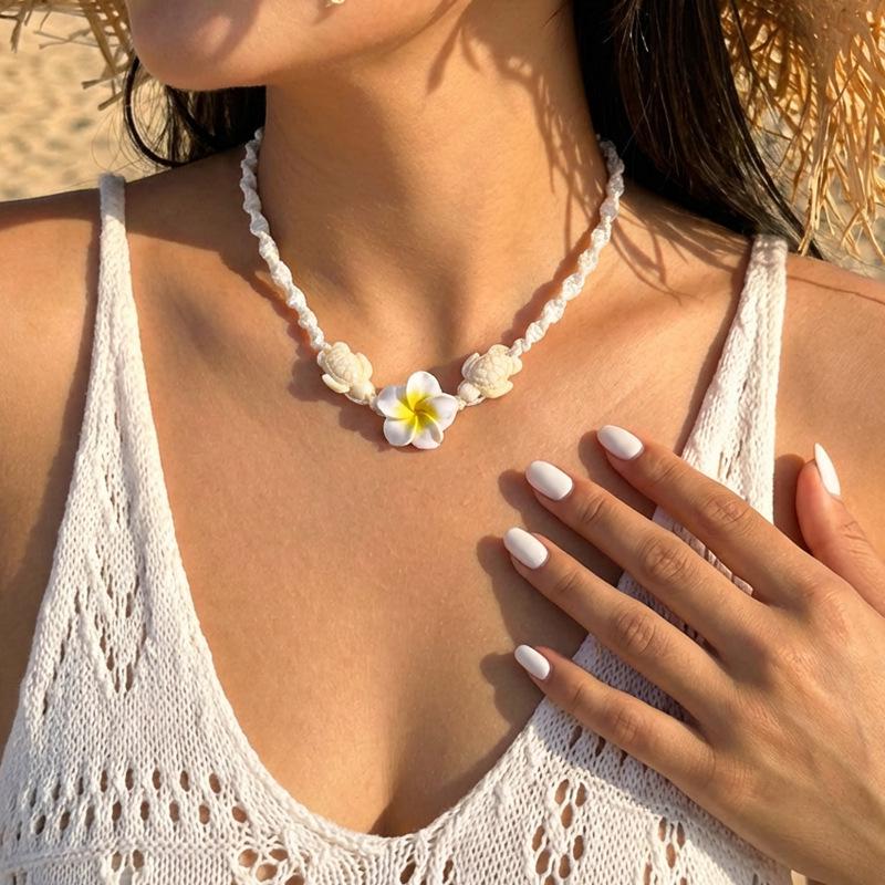 

Комплект Hawaiian necklace & earrings Plumeria & Rice Beads от Shein