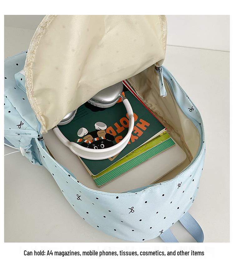 Polka Dot Bow Backpack for Teen Girls: Stylish and Versatile Schoolbag for Middle and High School Students.