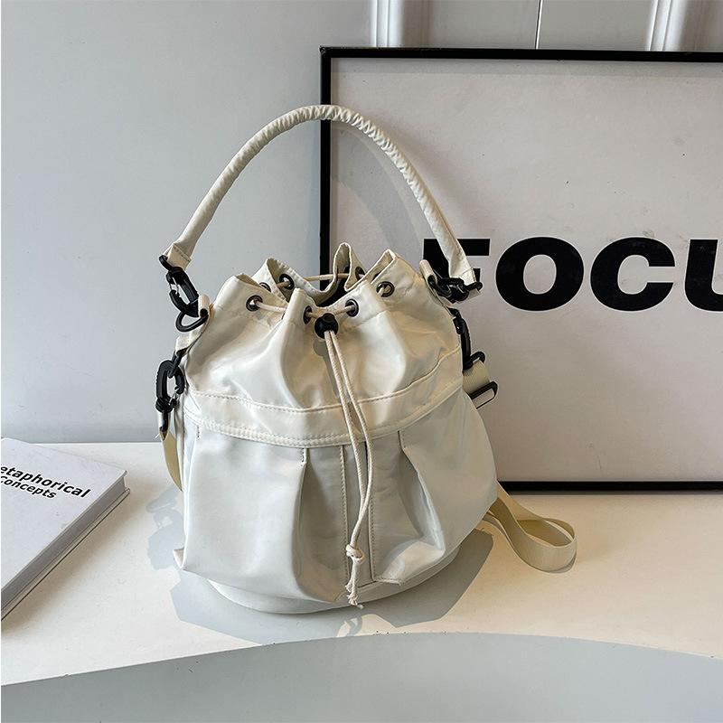 

Супер крутая индивидуальная нейлоновая водонепроницаемая сумка-ведро большой вместимости повседневная дорожная сумка модная одно плечо через плечо с завязкой на руку