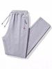 Pantaloni della tuta casual da uomo per primavera e autunno - Versatili, Taglie forti, Stile giovanile alla moda
