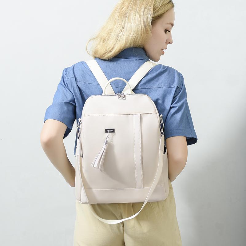 Neue Große Kapazität Einfachen Stil Casual Mochila Reise Frauen Design Quaste Rucksack Wasserdichte Stoff Große Weibliche Schulter Tasche