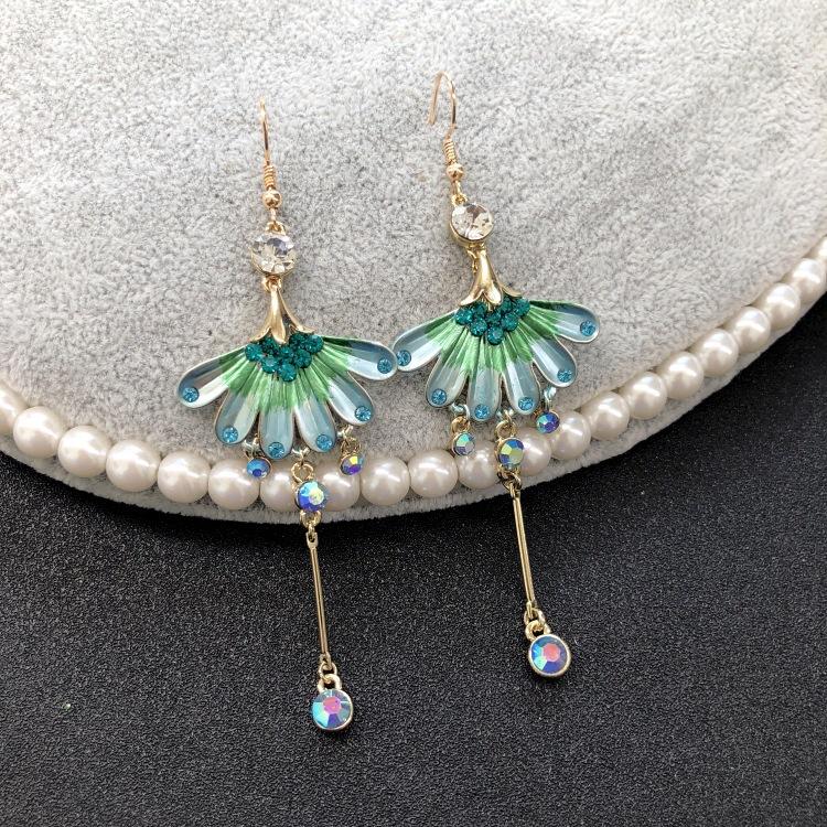 

Japan and Korea fashion light luxury diamond sandblasted fringed earrings butterfly flower earrings women s long temperament versatile ear jewelry