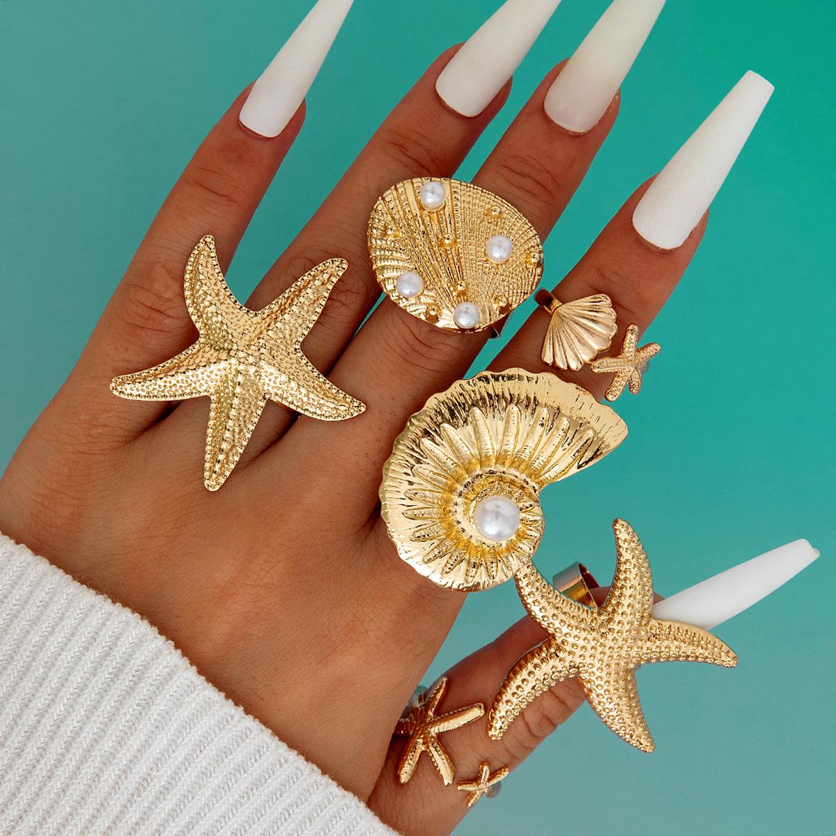 

JMXD-Отпускной стиль Регулируемый набор колец с ракушками морской звезды и искусственным жемчугом - Летние пляжные модные украшения Подарок для женщин