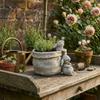 Bunny figurine with flowerpot cement vintage garden decoration