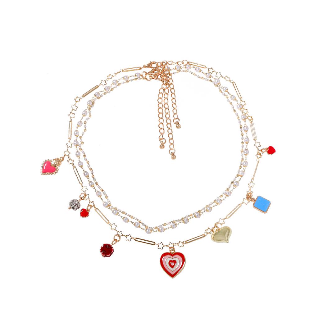 Koreanische Version von frischer und modischer Imitationsperlen-Dreischichtkette, gestapelte Halskette, öltropfenlegierter Liebesanhänger, Nischen-Damen