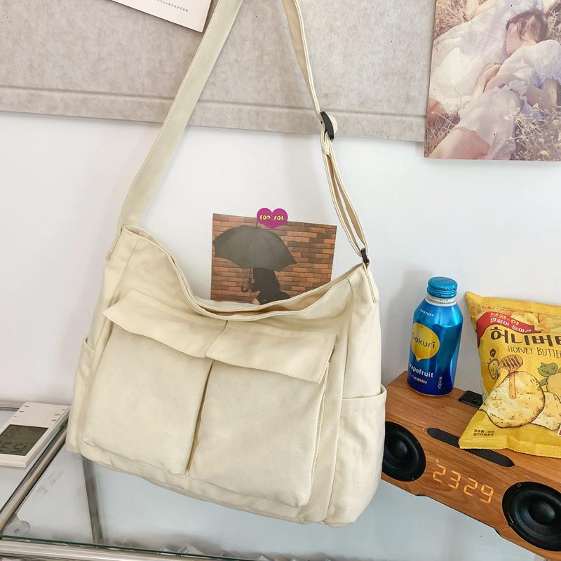 Women's Canvas Crossbody Tote - High-End Light Luxury Single Shoulder Bag, Niche Couple Style, Workwear Design.
