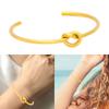 Elegant Geometric Open Knot Bangle Bracelet In Gold Finish Jewelry Accessory for Fashionable Women Seek Unique Styles