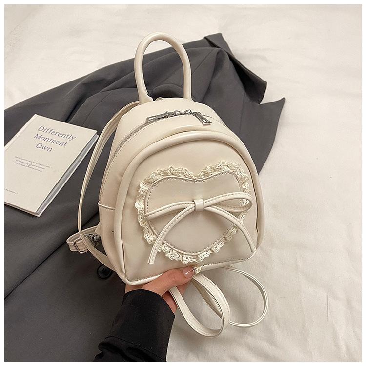 

Весна 2025 новый маленький рюкзак в балетном стиле женский для поездок на работу в иностранном стиле сумочка повседневный с ощущением зрелости рюкзак белый