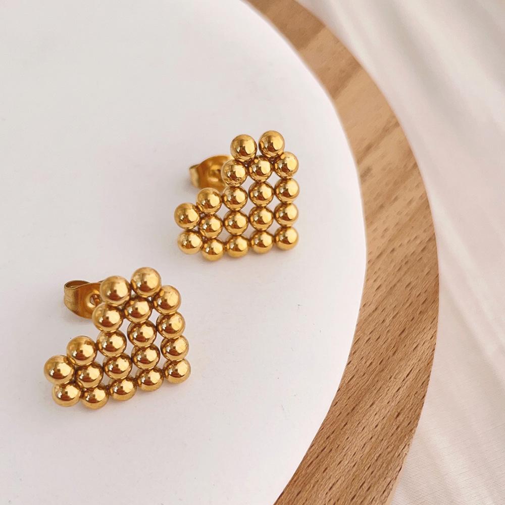 French personality trend niche peach heart stud earrings commuter versatile titanium steel earrings female niche