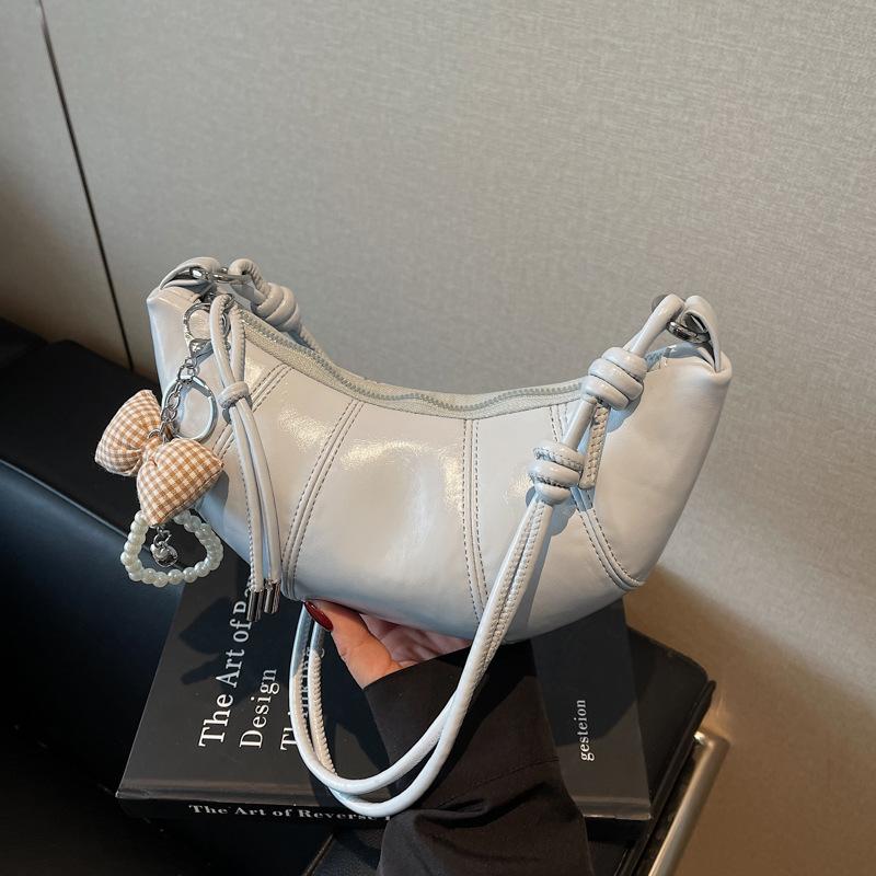 

Нишевая дизайнерская сумка женская 2025 новая летняя универсальная сумка-мессенджер высокого класса сумка-пельмень на плечо сумка-круассан синий