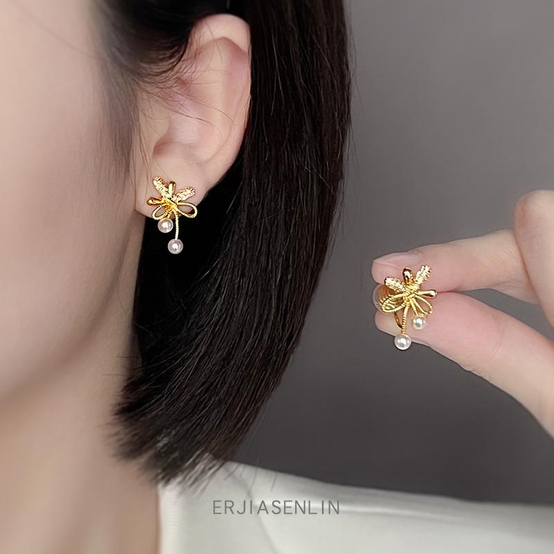 

Серьги женские осень-зима с бантом, новые, с жемчугом, легкая роскошь, высококлассные, нишевые, подчеркивающие темперамент, уникальные серьги