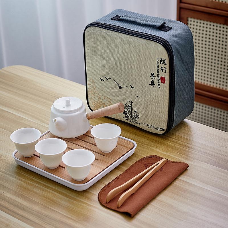 Dehua white porcelain tea set, practical ceramic cover bowl, one pot, four cups, outdoor storage, travel convenience bag, business small gifts