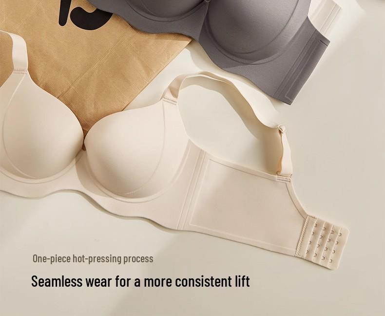 Bezszwowy biustonosz damski: Minimalizuje biust, Wspiera boczki, Bez fiszbin, Bez prześwitów, Podnoszący, Lekki dla większych biustów.