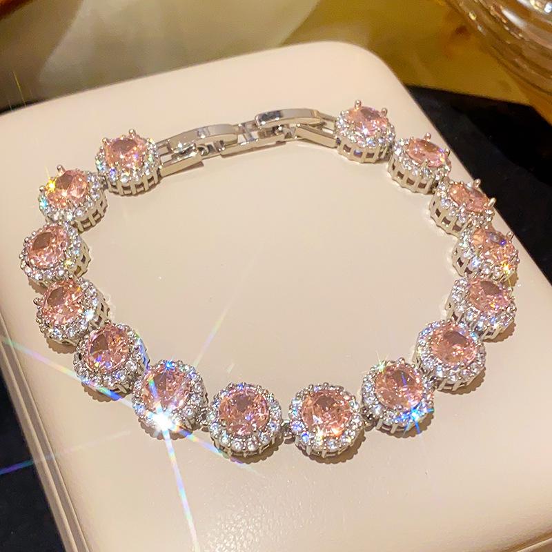 Pink Diamond Zirconia Starburst Flower Bracelet: Trendy, Luxurious Jewelry with Unique Design.