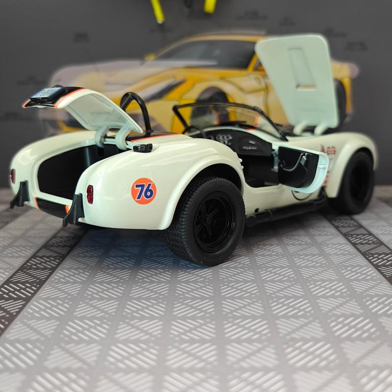 CDKM1 1:22 simulation Ford Cobra convertible sports car alloy model car ornament, door can be opened, steering shock absorber