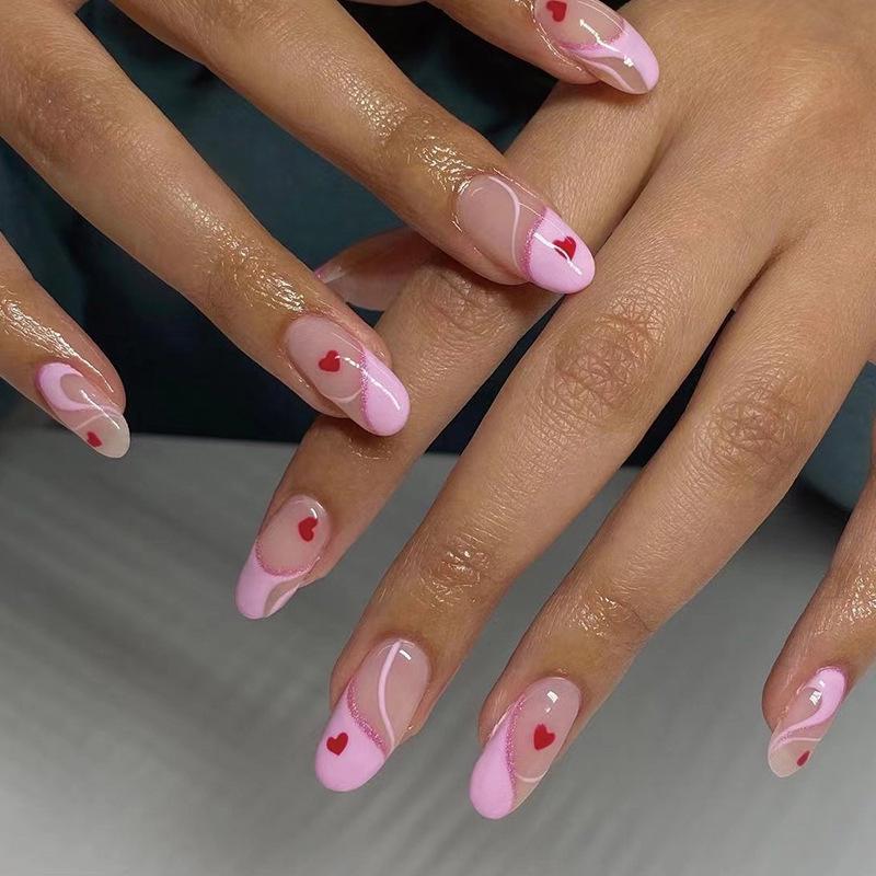 

Nail Tips: Pink Edge French with Small Red Hearts, Reusable & Removable.