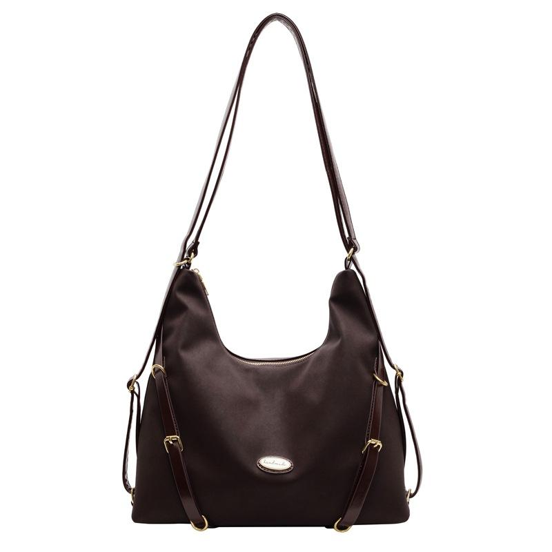 Herbst und Winter Beliebter Retro Wildleder Rucksack Damen Neuer College-Stil Pendlertasche Trendige Tragetasche mit großer Kapazität