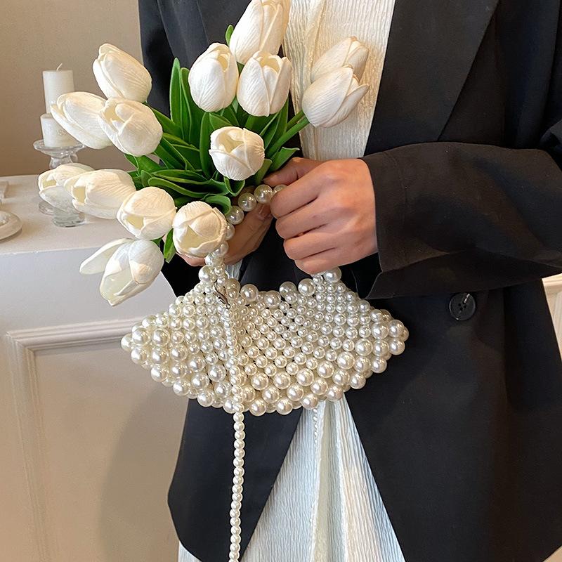 Bag summer new 2025 Mori foreign style Internet celebrity pearl woven bag ins wind one shoulder oblique fairy beach bag