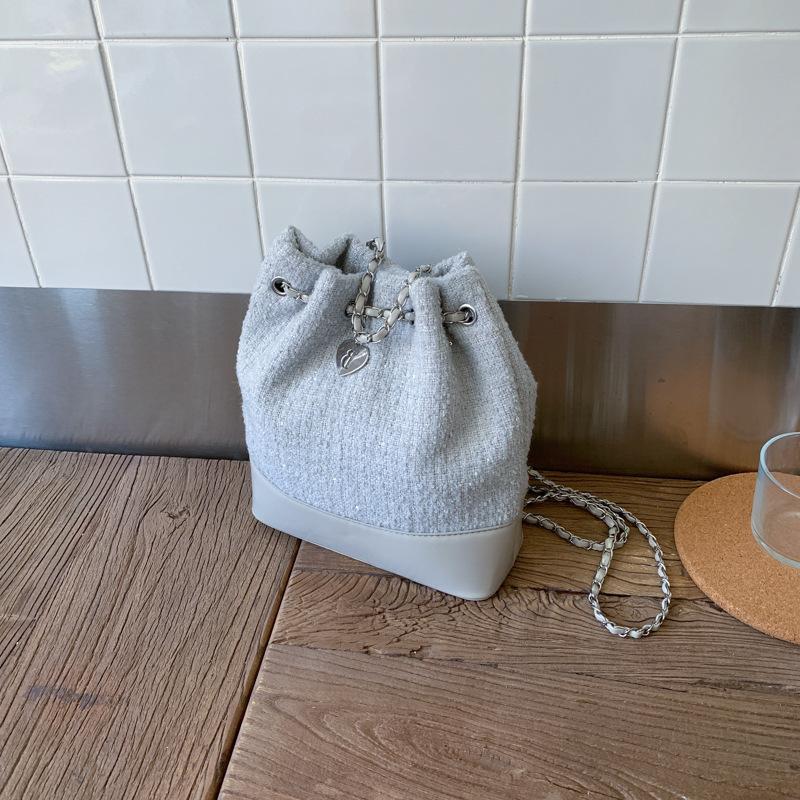 Woolen chain backpack women's leisure niche design student schoolbag bucket bag high value travel backpack