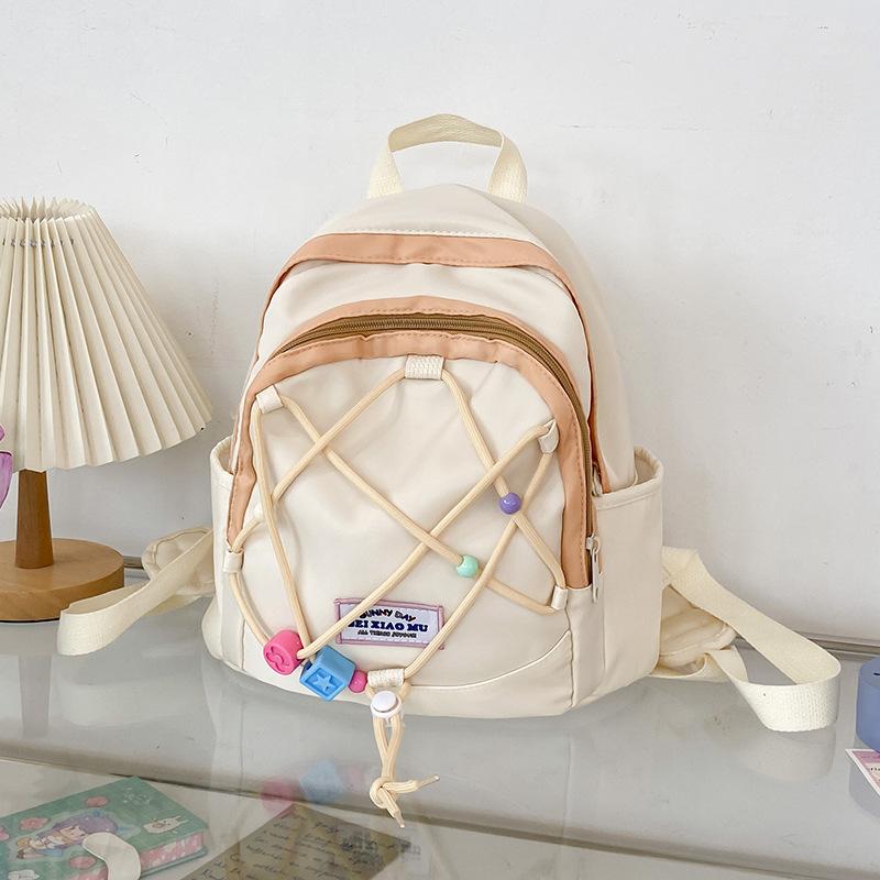 

Small fresh girl small schoolbag small backpack simple contrasting color kindergarten primary school students lightweight double backpack белый