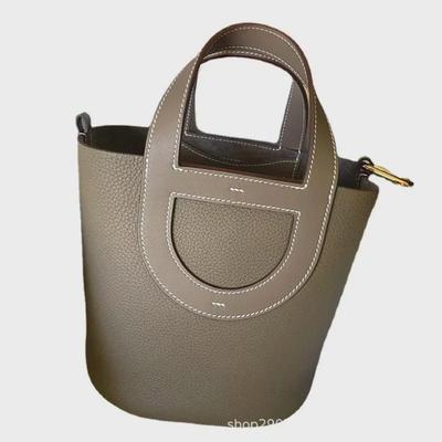 Damenhandtasche aus echtem Rindsleder – 2023 Spring Bucket Bag mit Schweinsnasen-Design und einzelnem Schultergurt