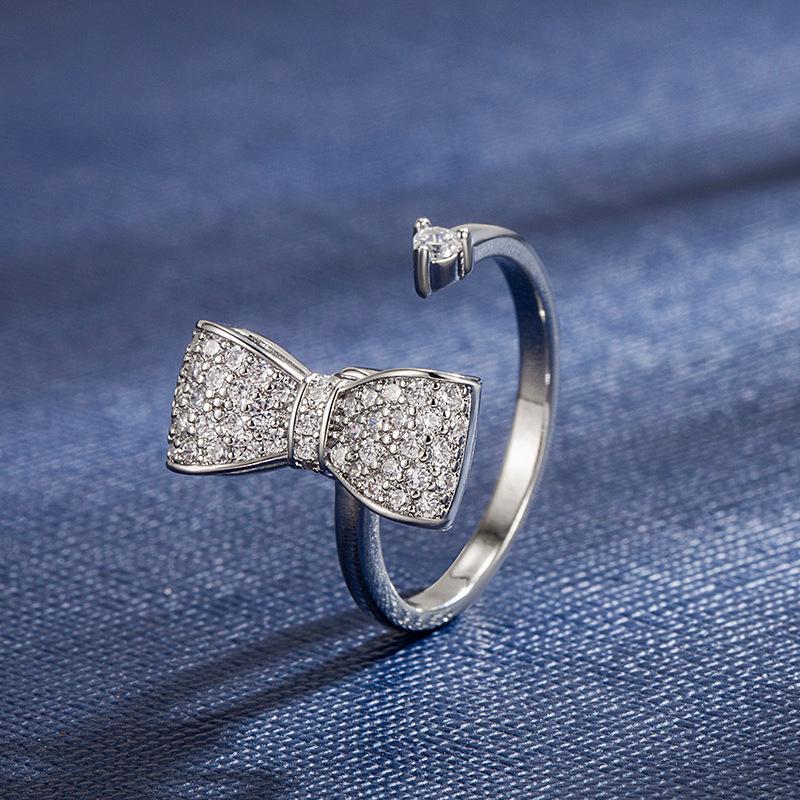 2025 Trendy Rotating Bow Ring: Stackable Women s Copper Plated in Real Gold Electroplate