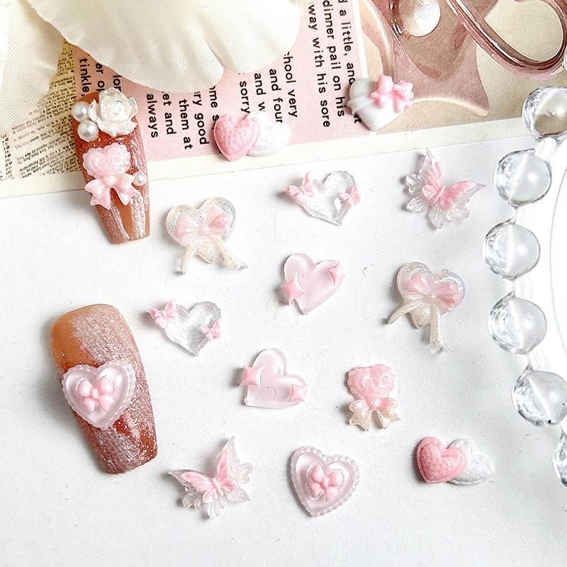 50Pcs Pink Series Bow Heart Resin Nail Charms 3D Luminous Double Butterfly Peach Heart Sweet Wind Nail Art Decorations DIY Nails