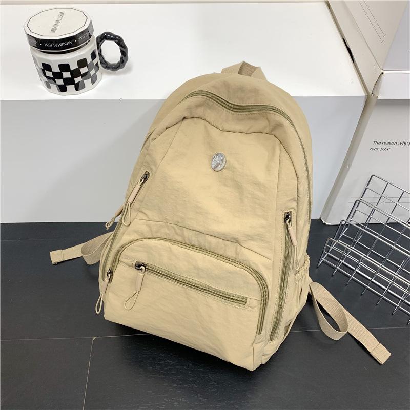 The Backpack Is Lightweight, Casual, and Has A Large Capacity. It Is A Simple and Fashionable Student Schoolbag