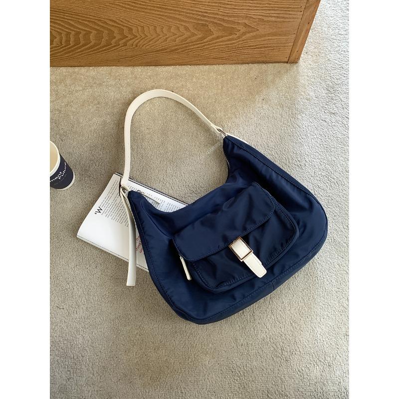 

Nylon dumpling bag large-capacity casual bag women s versatile splicing design new shoulder bag синий