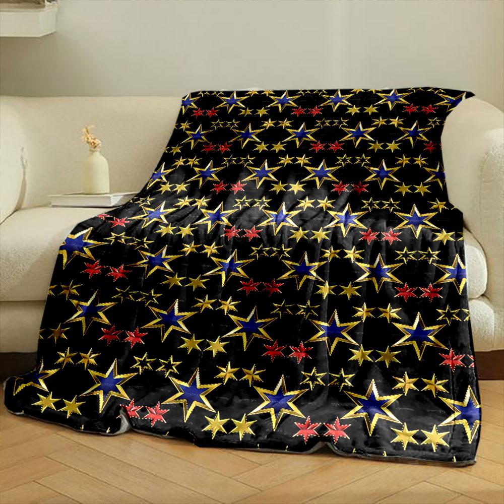 Alternating blue, gold, and red stars form a repeating pattern on black. for all seasons blanket lunch break throw gift
