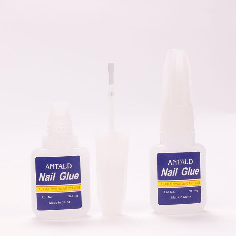 Quick-Dry Nail Glue 10g with Brush Head - Strong Adhesive for Nails and Rhinestones (Blue Bottle)